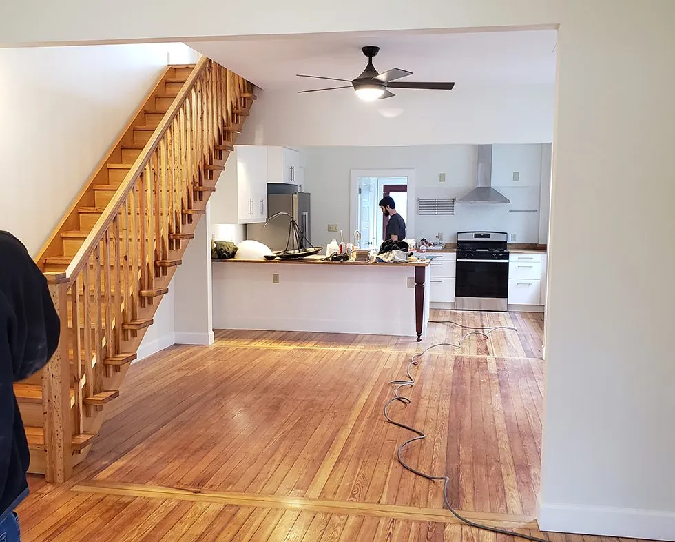 Repaired and refinished hardwood hallway floor in a Lexington, Kentucky home